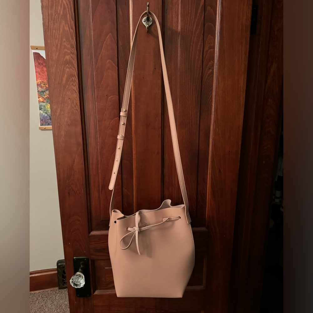 Pale pink bucket bag